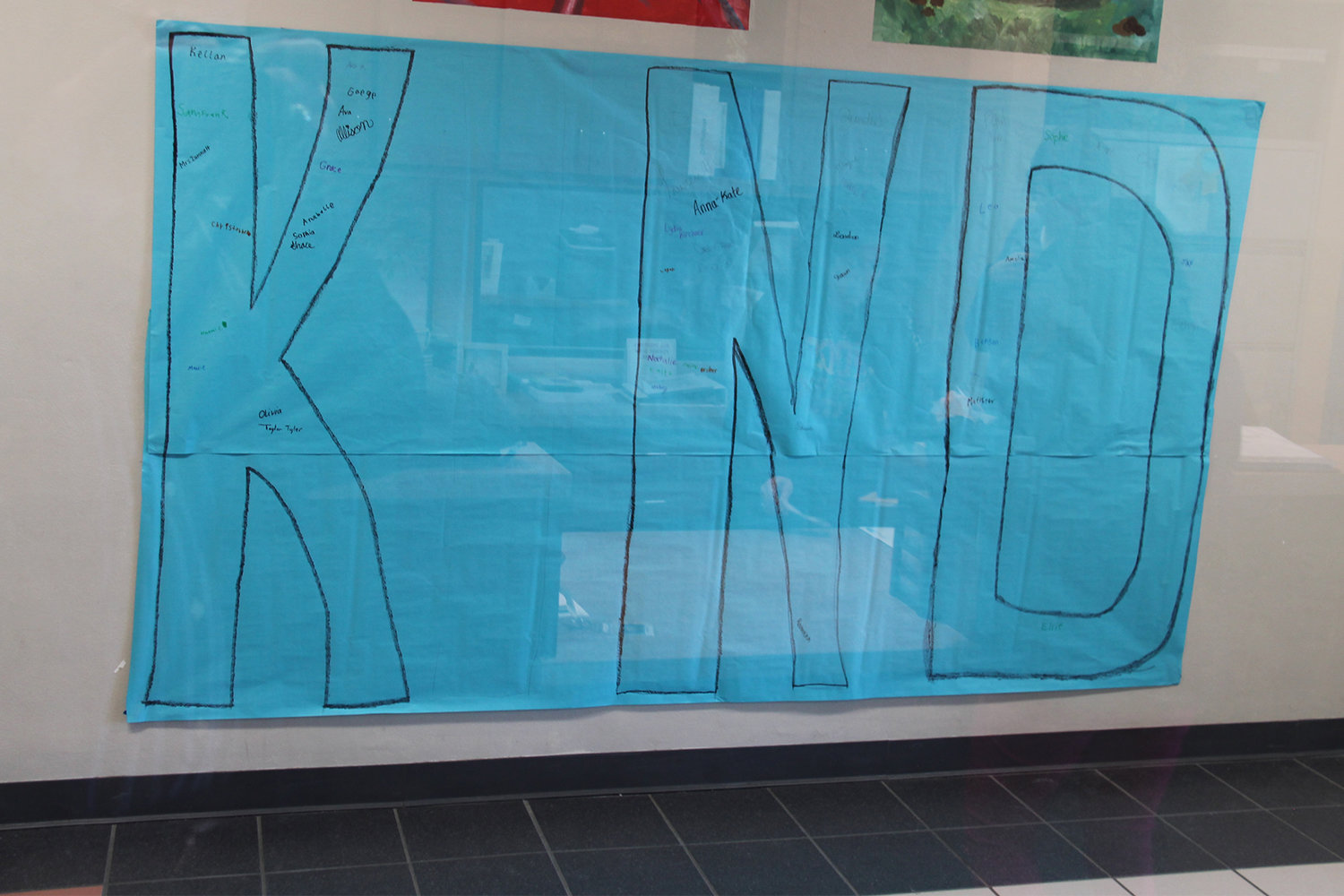 A large banner shows illustrates that you can't spell "KIND" without "I."